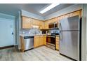 Well-equipped kitchen with stainless steel appliances and ample cabinet space, perfect for any home cook at 1400 Ocean Blvd # 106B, Isle of Palms, SC 29451