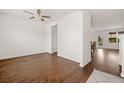 Bright, open room featuring beautiful wood flooring, a ceiling fan, and neutral walls at 199 Decatur Dr, Summerville, SC 29486