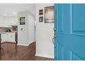 Bright foyer with a view of the updated kitchen and beautiful hardwood floors at 4752 Trailside Ct # B, North Charleston, SC 29418