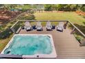 Relaxing hot tub on a private deck, perfect for unwinding and enjoying the view at 634 Lynne Ave, Charleston, SC 29412
