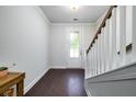 Welcoming entryway with dark wood floors, white trim, and a bright, airy feel at 1630 Mermentau St, Mount Pleasant, SC 29466