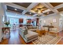 Inviting living room with an open layout showcasing hardwood floors, modern décor, and abundant natural light at 1872 Staffwood Rd, Johns Island, SC 29455
