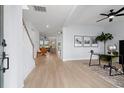 Spacious entryway with light wood floors, leading to the living room and office at 347 Ripple Park Dr, Summerville, SC 29486