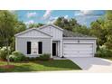 Beautiful home featuring gray siding and a two-car garage with a well-maintained lawn and landscaping at 528 Blue Mistflower Dr, Moncks Corner, SC 29461