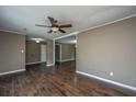 Comfortable living area with hardwood floors and a ceiling fan at 610 Old Golf Rd, Summerville, SC 29483