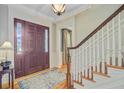 Foyer with wood door, staircase, and hardwood floors at 750 Navigators Run, Mount Pleasant, SC 29464