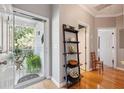 Welcoming foyer entrance with a view of the front porch and natural light at 2329 Tall Sail Dr # 704D, Charleston, SC 29414