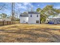 Spacious backyard with full fencing is ready for entertaining or recreation at 518 Fleming Rd, Charleston, SC 29412
