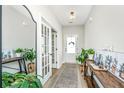 Bright entryway featuring wood-look flooring, stylish decor, and a view of the home's interior at 119 Lucca Dr, Summerville, SC 29486