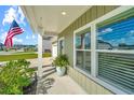 Inviting front porch with stylish columns, a decorative planter, and a clear view of the neighborhood at 119 Lucca Dr, Summerville, SC 29486