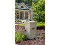 Close-up of the address marker, showcasing the home's street number and manicured landscaping at 441 Elfes Field Ln, Charleston, SC 29492