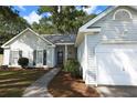 Charming single-story home featuring a well-manicured lawn and attached one car garage in a desirable neighborhood at 714 Alwyn Blvd, Summerville, SC 29485