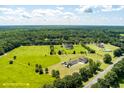 Expansive aerial view showcasing the property's boundaries, lush greenery, and surrounding landscape at 1111 Sandy Springs Circle, Walterboro, SC 29488