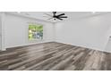 Bright room with wood floors and natural light streaming through the window at 207 Terry Ave, Summerville, SC 29485