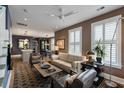 Bright living room with large windows, stylish furniture, and an open layout at 211 Line St, Charleston, SC 29403
