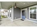 Charming front porch with a decorative door, offering a welcoming entrance to the home at 2331 Brinkley Rd, Johns Island, SC 29455