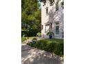 Inviting home with manicured lawn and potted plants lining the steps leading to a bright, cheerful entrance at 429 Venning St, Mount Pleasant, SC 29464