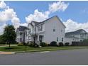 A well-manicured lawn and landscaping complement the exterior of this home in a desirable neighborhood at 558 Pendleton Dr, Moncks Corner, SC 29461