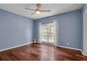 Charming bedroom features hardwood floors, ample natural light, and neutral paint at 700 Daniel Ellis Dr # 3108, Charleston, SC 29412