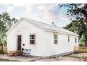 Well-maintained home with a fresh white exterior, neatly framed windows, and a welcoming front entrance at 2157 Jeff St, North Charleston, SC 29405