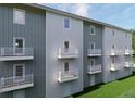Multi-Gathering building with private balconies, neutral siding, and well-maintained landscaping at 2161 W Jimtown Dr # 101, North Charleston, SC 29405
