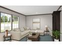 Bright living room with a neutral-toned sofa, stylish decor, and plenty of natural light from the large windows at 313 Marion Rd, Dorchester, SC 29437