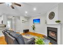 Spacious living room with hardwood floors, a fireplace, and an open layout for modern living and entertaining at 4030 Babbitt St, Charleston, SC 29414