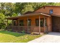 Inviting home exterior showcasing a cozy covered porch perfect for relaxing outdoors at 5904 Hagood Ave, Hanahan, SC 29410