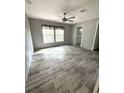 Spacious bedroom with wood-look flooring, neutral paint, and a ceiling fan at 144 Craft Ln, Round O, SC 29474