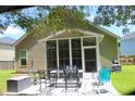 Spacious screened porch provides an ideal spot for entertaining and relaxation at 207 Short Woods Ct, Summerville, SC 29486