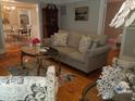 Comfortable living room with hardwood floors and a view of the dining area and adjacent rooms at 3646 Hilton Dr, Johns Island, SC 29455