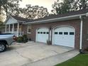 Spacious two-car garage providing ample parking and storage space at 106 Labrador Ct, Summerville, SC 29485
