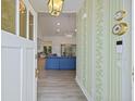 Inviting entryway showcasing wallpaper and a view into the main living area at 1075 Wayfarer Ln, Charleston, SC 29412