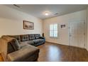 Cozy living room with a comfortable sectional sofa and wood floors at 143 Dorothy Dr, Charleston, SC 29414