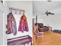 Warm entryway featuring a convenient coat rack and a glimpse into the inviting living area at 208 Janice St, Goose Creek, SC 29445