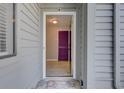 Entryway features unique purple door at 8483 Yadkin Cir # D, North Charleston, SC 29406