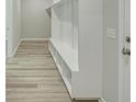 Well-designed mudroom with built-in storage and seating at 0 Peirce Rd, Ridgeville, SC 29472