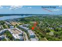 Gorgeous aerial view showcasing the property's proximity to Ravenel Bridge and lush surroundings at 125 Pier View St # 408, Charleston, SC 29492