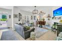 Inviting living room featuring comfortable seating, a neutral color scheme, and ample natural light at 1682 Camfield Ln, Mount Pleasant, SC 29466