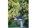 Aerial view of home nestled among green trees, offering privacy and a serene environment at 3435 Hobson Dr, Johns Island, SC 29455