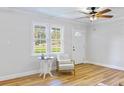 Cozy sitting area featuring large windows and modern flooring at 400 Black Oak Rd, Bonneau, SC 29431
