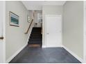 Bright entryway features staircase and neutral paint for a modern look at 1604 Basildon Rd, Mount Pleasant, SC 29466