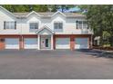 Well-maintained townhouse with attached garages and a welcoming entrance at 1604 Basildon Rd, Mount Pleasant, SC 29466