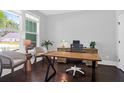 Bright home office with hardwood floors and plenty of natural light at 217 Quimby Hill Dr, Huger, SC 29450