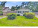 Charming single-story home boasting a well-maintained lawn and classic curb appeal at 316 Simmons Ave, Summerville, SC 29483