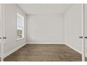 Neutral bedroom featuring hardwood floors and natural light at 353 Wappoo Trace Ln, Summerville, SC 29486