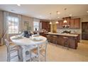 Spacious kitchen with modern appliances and eat-in breakfast bar at 507 Cropfield Dr, Summerville, SC 29485