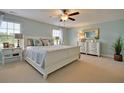 Cozy main bedroom with a ceiling fan and ample natural light at 507 Cropfield Dr, Summerville, SC 29485