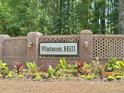 Brick entrance sign for Watson Hill featuring manicured landscaping at 5307 Bending Flats Way, Summerville, SC 29485