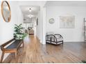 Bright entryway featuring hardwood floors, stylish decor, and an inviting atmosphere at 558 Pendleton Dr, Moncks Corner, SC 29461